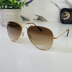 Ray-Ban Sunglasses. Gold Aviator, Brown Lenses. RB3025 58mm